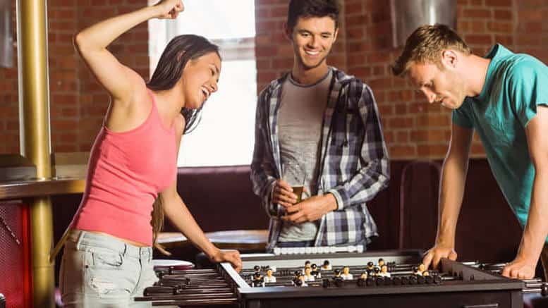 Woman Winning In Foosball