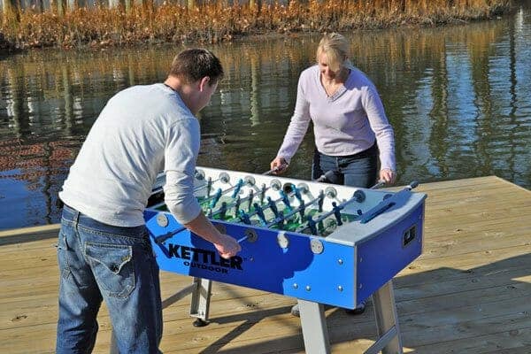 outdoor foosball tables near the water